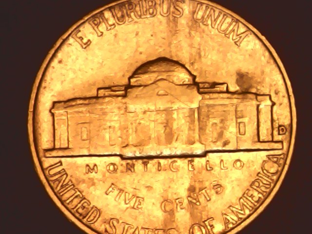 1959-D-Nickel-With-Something-Struck-Onto....