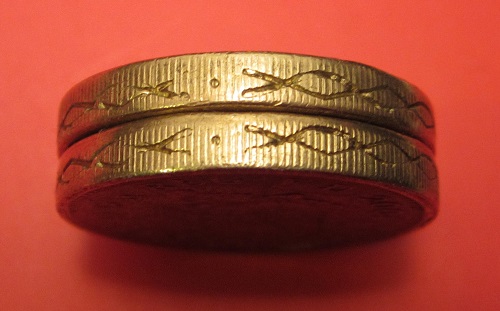 Fake-£1