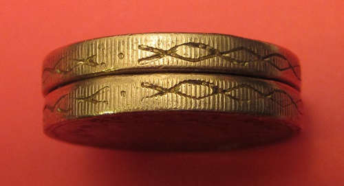 Fake-£1