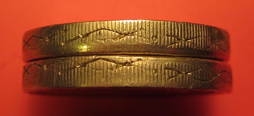 Fake-£1