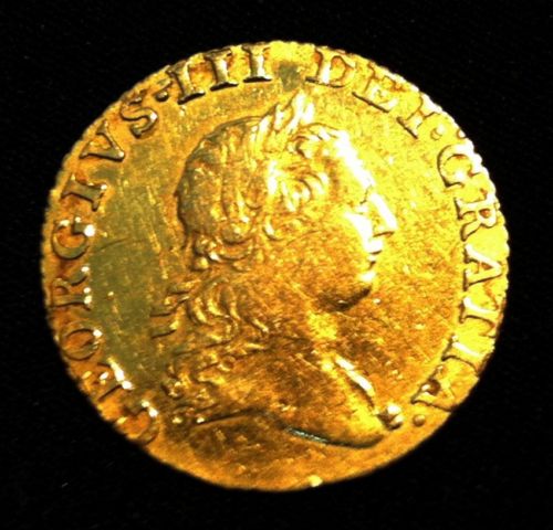 Corrosion/Discoloration-On-A-George-III-Half-Guinea