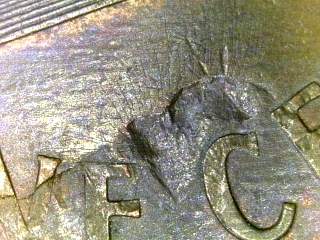 1998-Penny-Struck-Thru-Object
