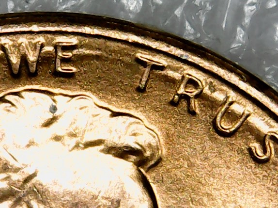 Penny-With-Raised-Half-Circle-Going-Thru-In-God-We-Trust
