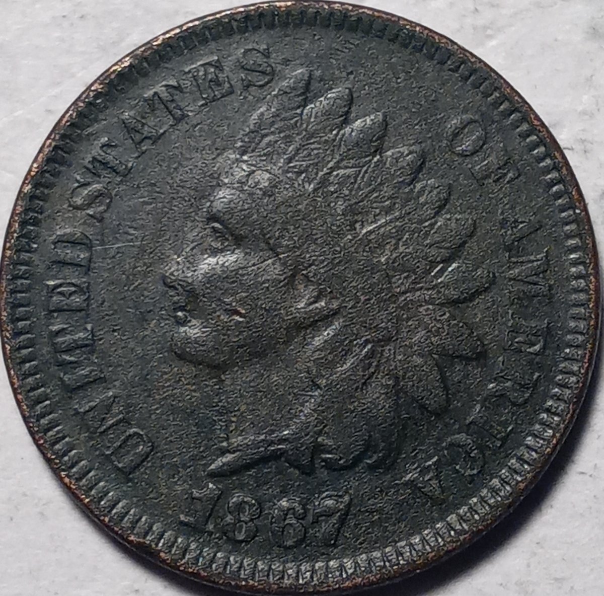 1867/67-Indian-Cent-RPD-High-Grade,-But-Corrosion