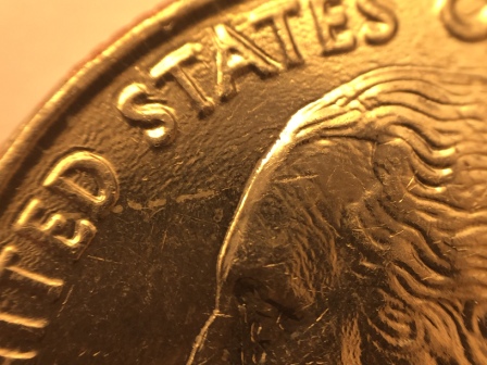 What-Causes-Coin-To-Look-Like-This?-2003-Quarter
