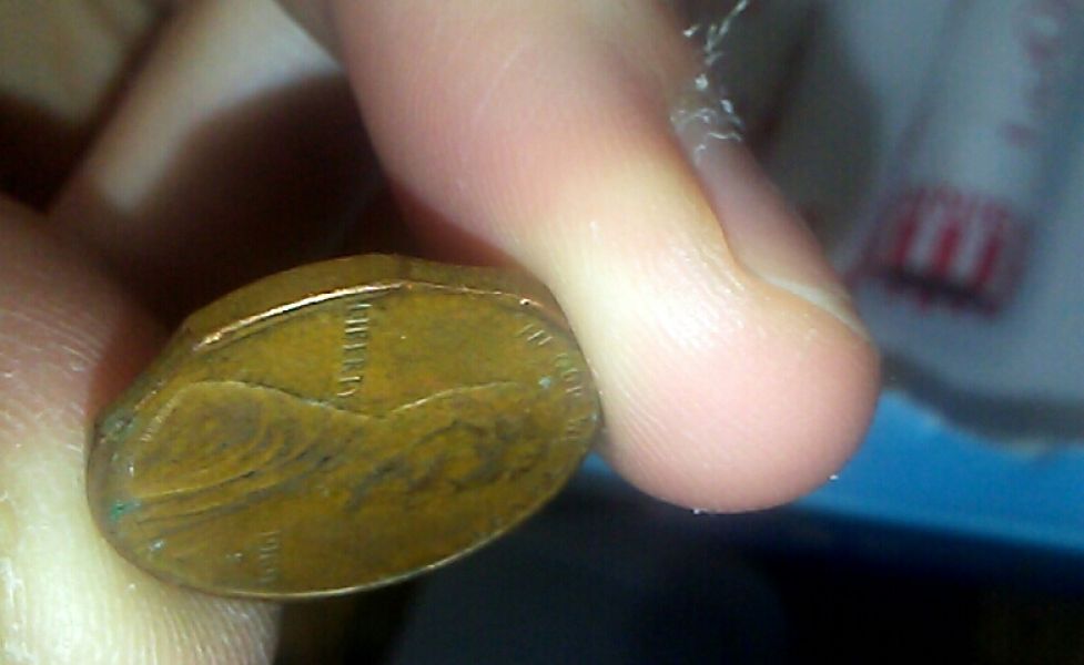 Is-This-A-1969-S-Penny-Error-Or-Damage?