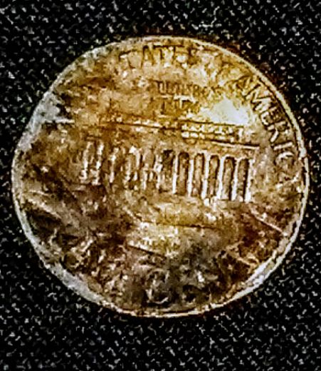 Can-Anyone-Tell-Me-Why-This-Penny-Is-Larger-Than-Others-And-Cant-Read-Date