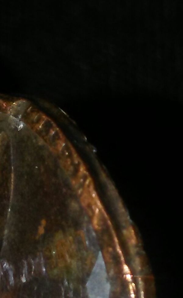 Can-Anyone-Tell-Me-Why-This-Penny-Is-Larger-Than-Others-And-Cant-Read-Date
