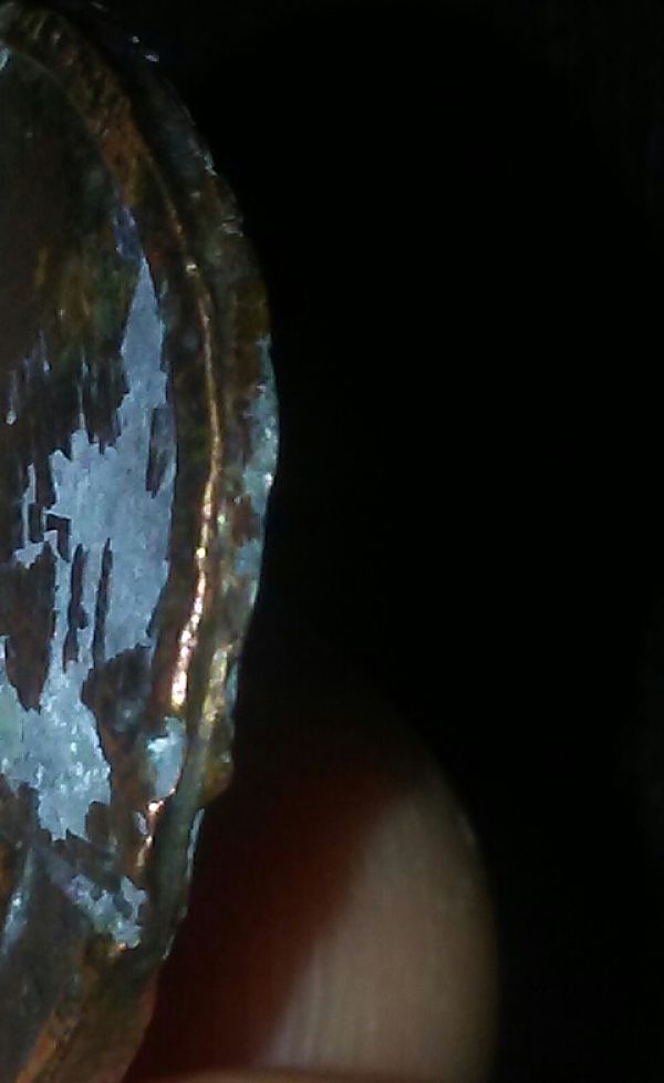 Can-Anyone-Tell-Me-Why-This-Penny-Is-Larger-Than-Others-And-Cant-Read-Date