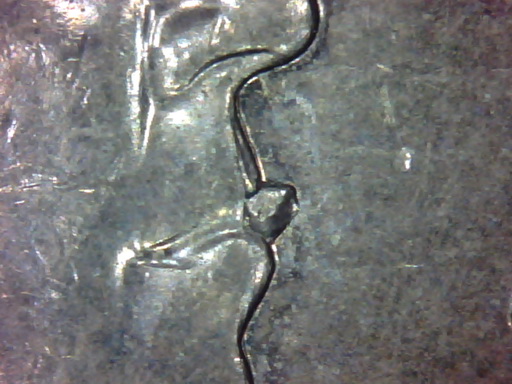 Found---NZ-$1-Coin-Obverse---Qeii-Crying?!-Error.