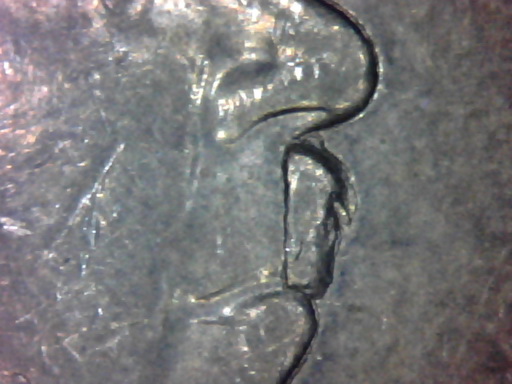 Found---NZ-$1-Coin-Obverse---Qeii-Crying?!-Error.