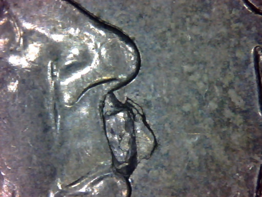 Found---NZ-$1-Coin-Obverse---Qeii-Crying?!-Error.