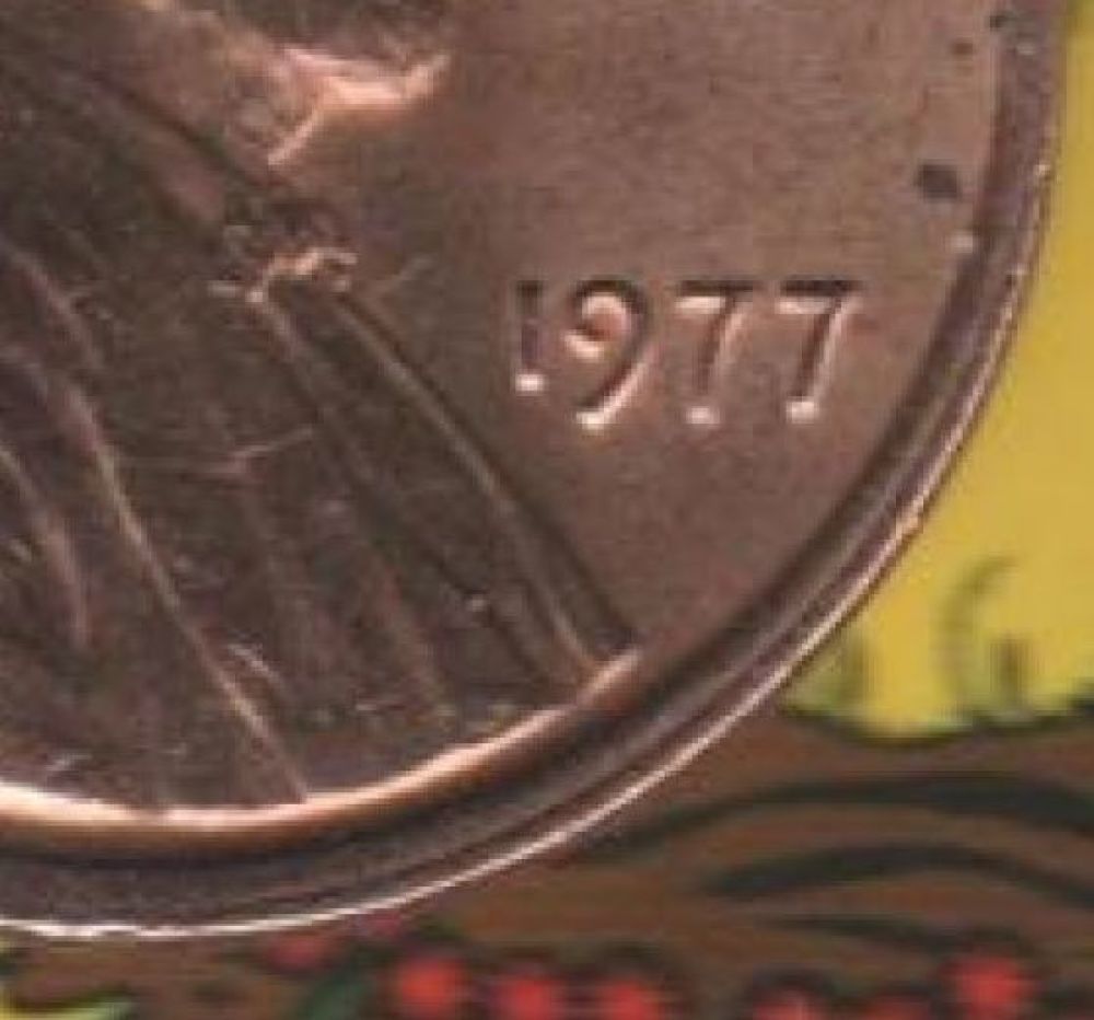 1977-Cent---Off-Center-Strike
