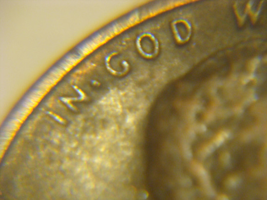 Dot-Between-'In'-And-'God'-On-1984-Lincoln