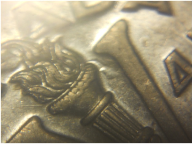 A-Die-Clash-On-A-1945-Nickel