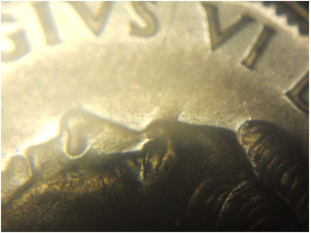 A-Die-Clash-On-A-1945-Nickel