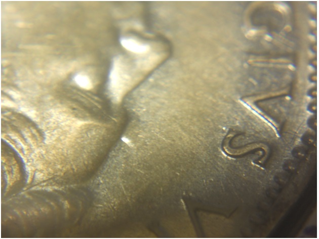 A-Die-Clash-On-A-1945-Nickel