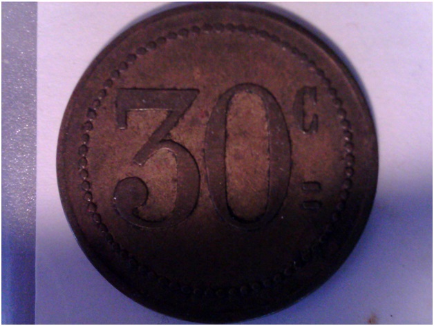 Unidentified-Token-With-30c-On-It
