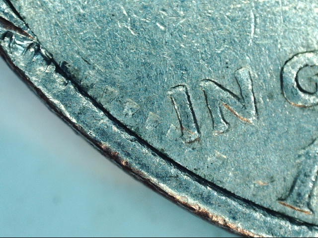 Is-This-1974-D-A-Error-Coin-These-Rim-Tracks