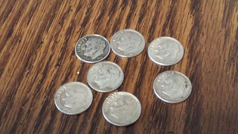 Michigan:-Coin-Searching-Dimes,-Nickels,-Pennies,-Quarters,