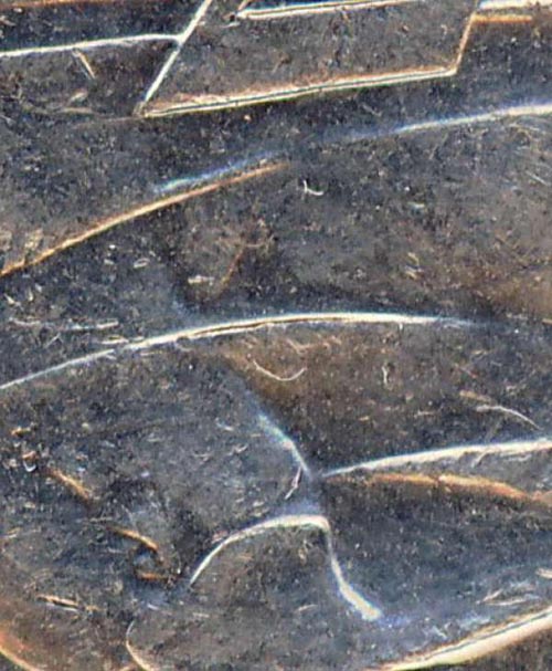 4-Half-Claws-On-20-Cent-Coin