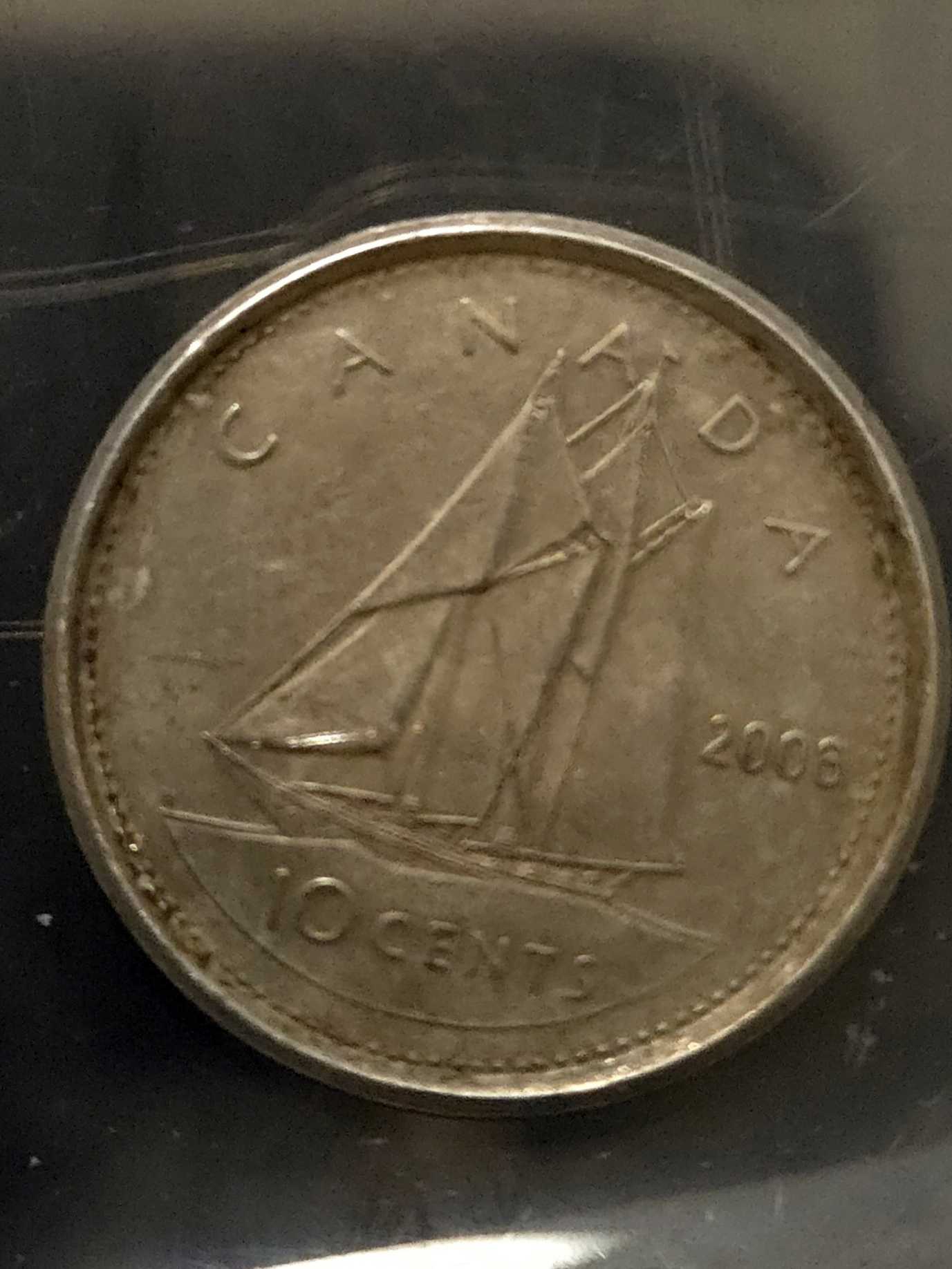 This-Dime-Seems-To-Be-A-Different-Metal,-Any-Insight?