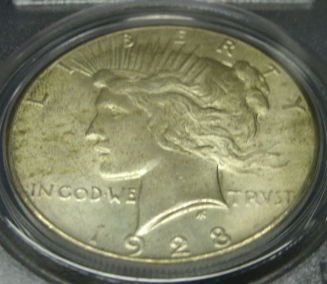 Just-Obtained--1928-P-MS-63-Peace-Dollar