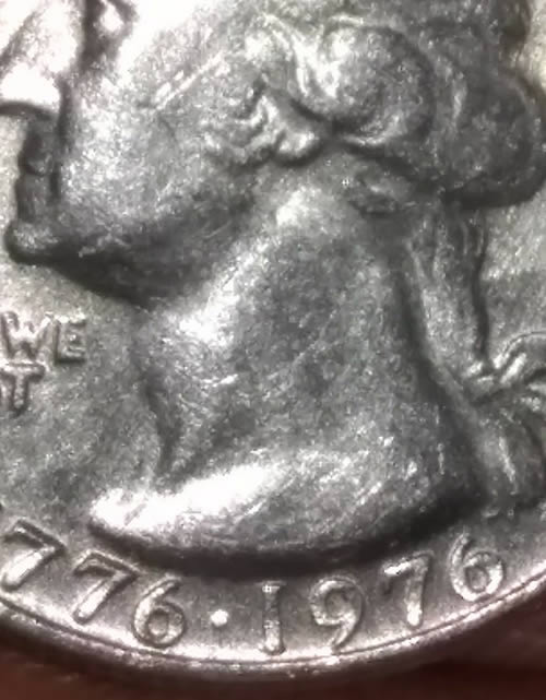 Are-My-Eyes-Playing-Tricks-On-Me-Or-Can-You-See-It-Too-1976-Quarter?