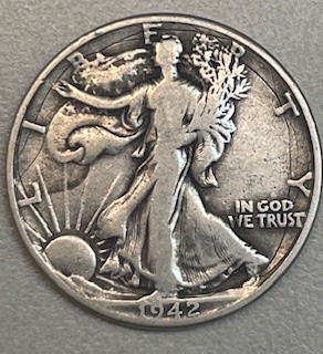 1942-No-Mint-Mark-Half-Dollar---Looks-To-Be-Struck-On-Damaged-Planchet.