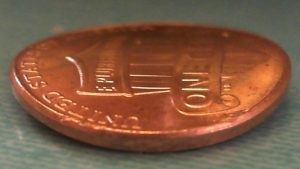 2012-Penny-And-1981-Quarter-Help?