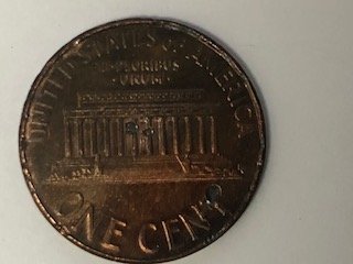 2007-Penny-Multiple-Holes-On-Front-And-Back-Error-Or-Damage?