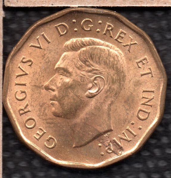 1942-Tombac-Retained-Lamination
