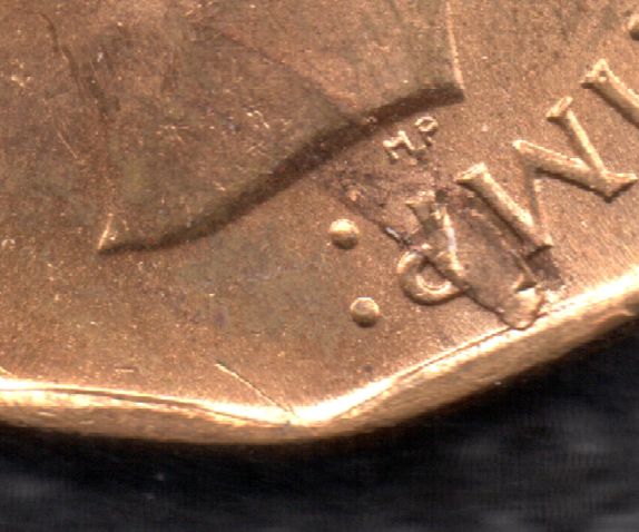 1942-Tombac-Retained-Lamination
