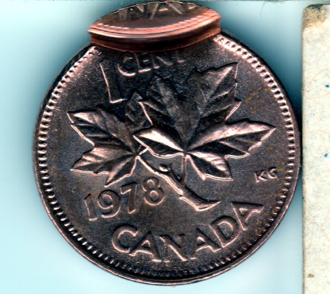 1999-July-25-Cents.--Mirror-Brockage