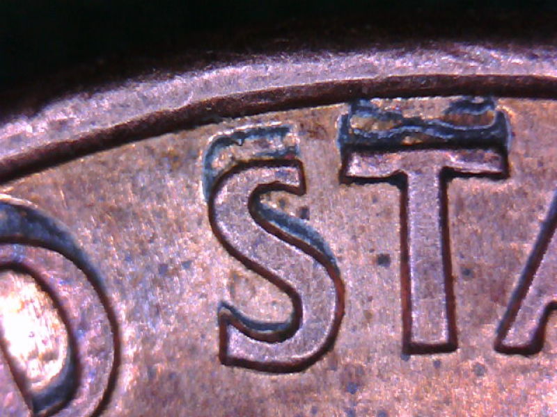 Question,-What-Causes-This-To-Coins,-Mainly-Pennies.