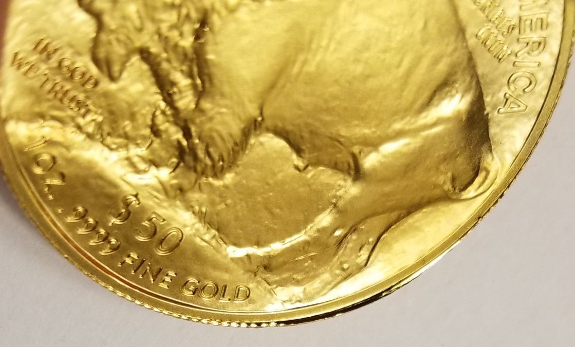 1-Oz-Gold-Buffalo-Off-Center.