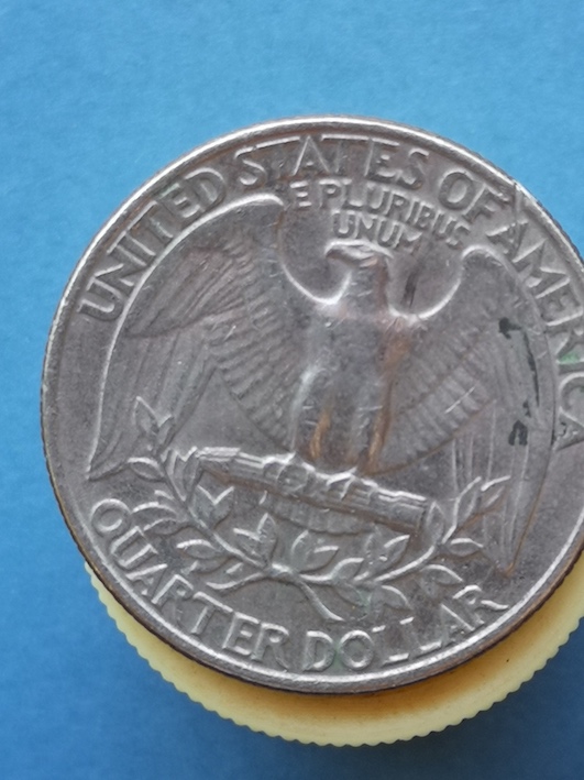 1981-D-Mint-Quarter-Dollar.damage-To-Reverse-By-Die-?