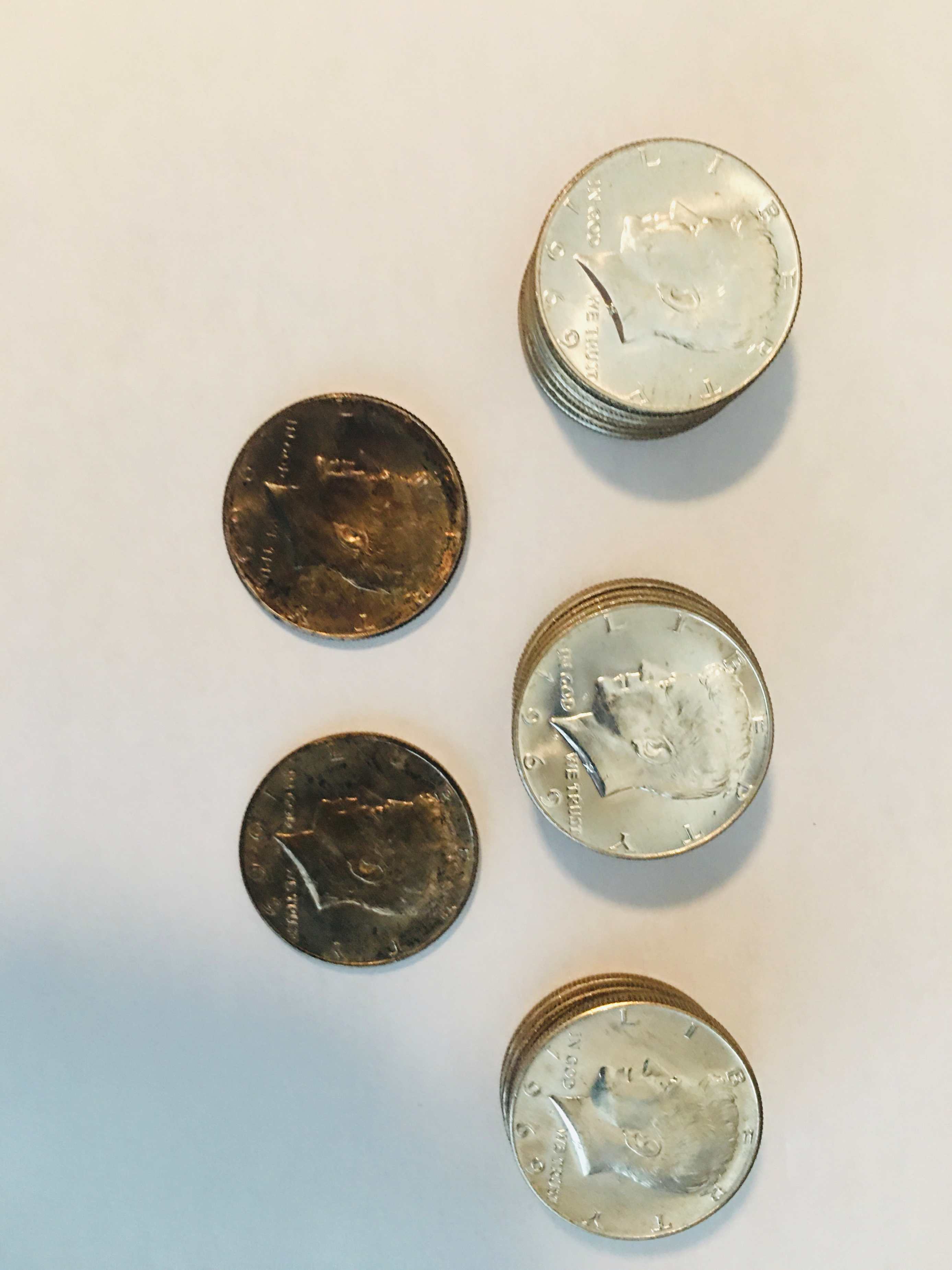 Acquired-A-Customer-Wrapped-Roll-Of-Uncirculated-1969-Kennedy-Half-Dollars