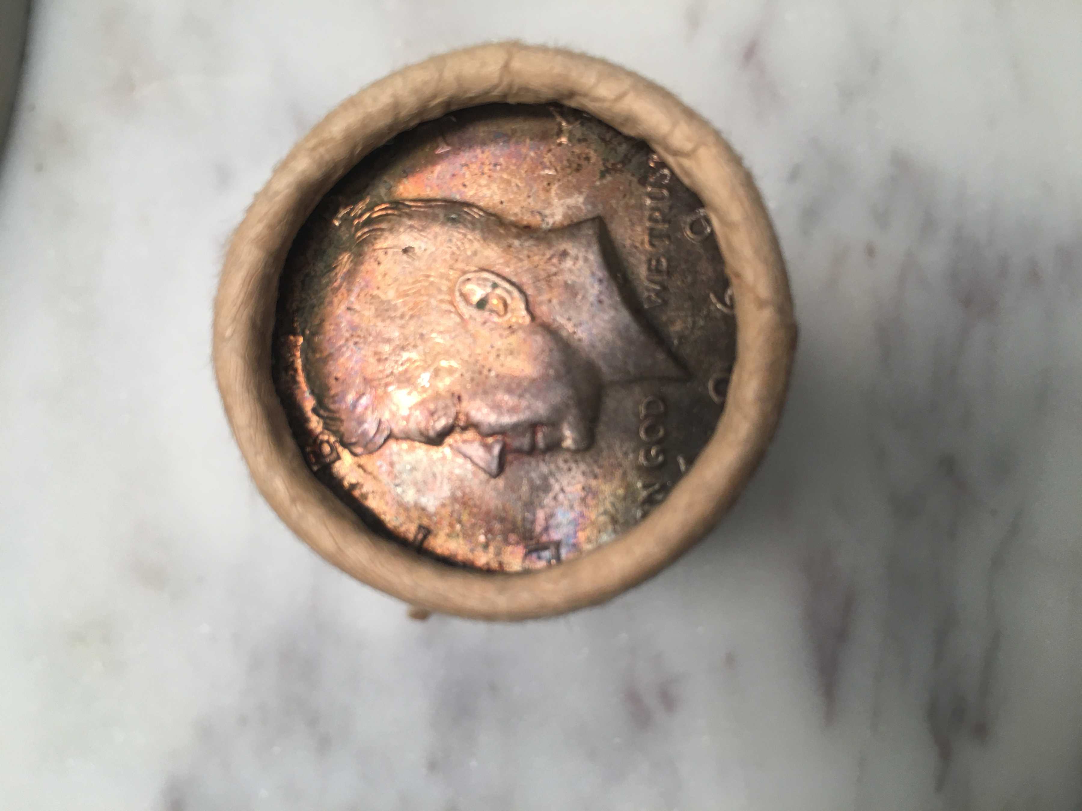 Acquired-A-Customer-Wrapped-Roll-Of-Uncirculated-1969-Kennedy-Half-Dollars