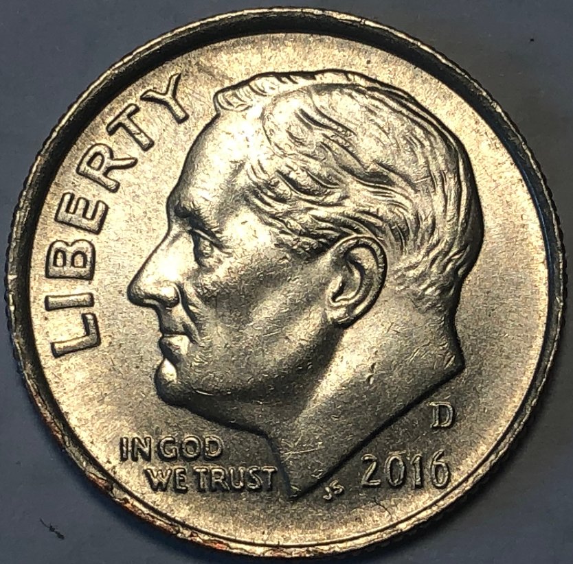 Copper-Showing-In-The-Rims-Of-Clad-Coins