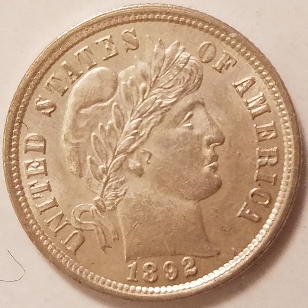 1892-Barber-Dime-In-Hand