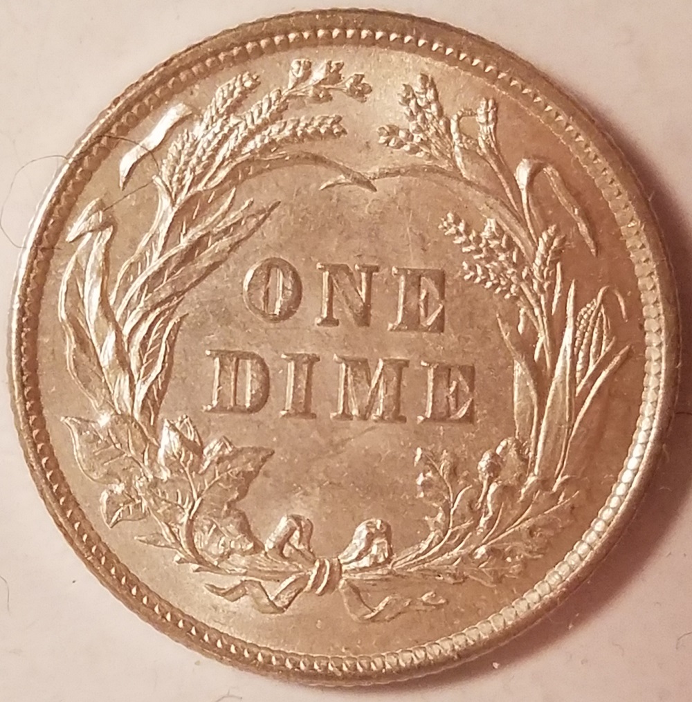 1892-Barber-Dime-In-Hand