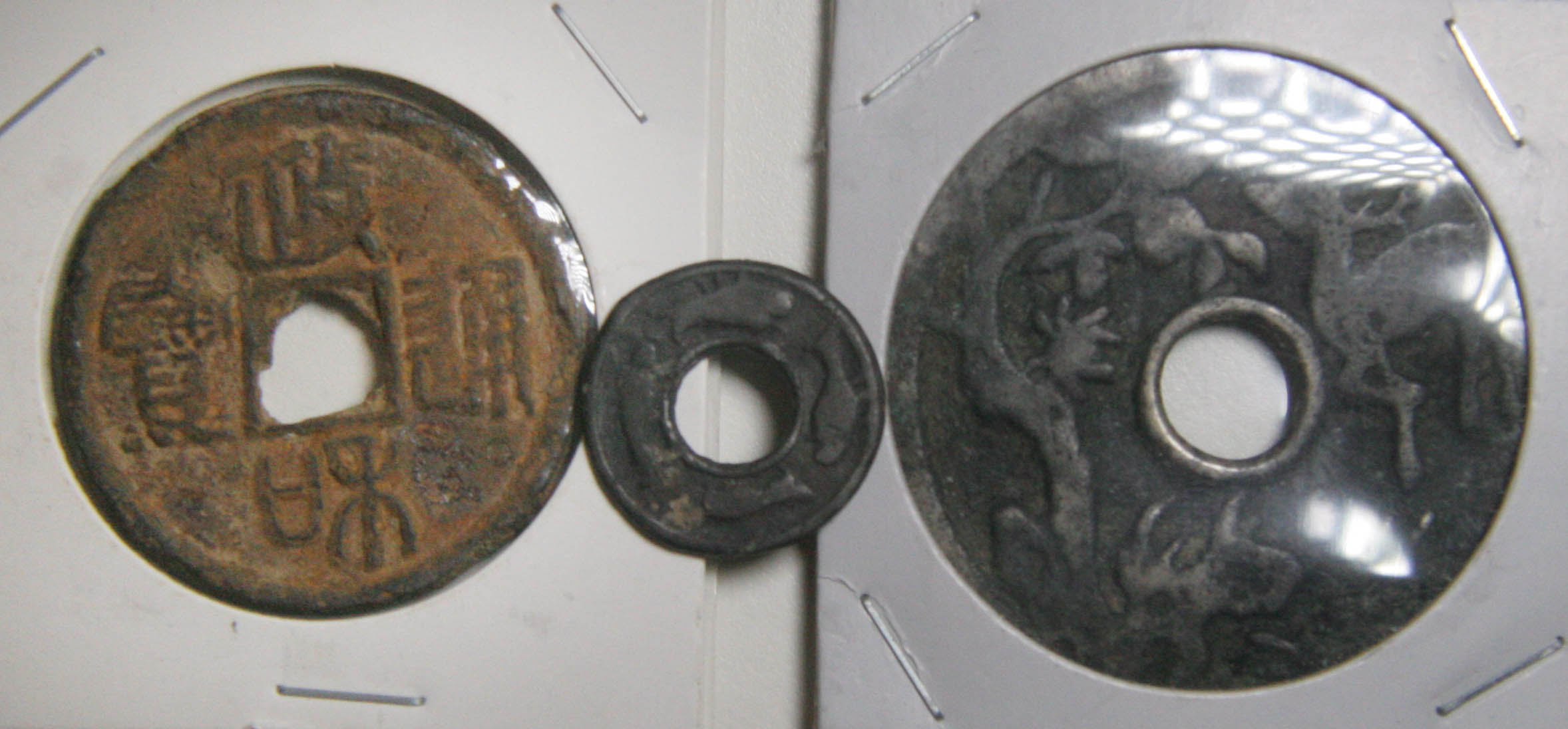 Mystery-Of-The-3-Holed-Coins---Help-Pls.