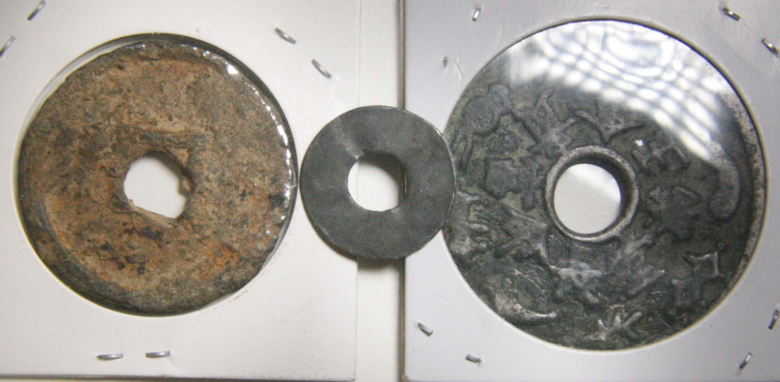 Mystery-Of-The-3-Holed-Coins---Help-Pls.