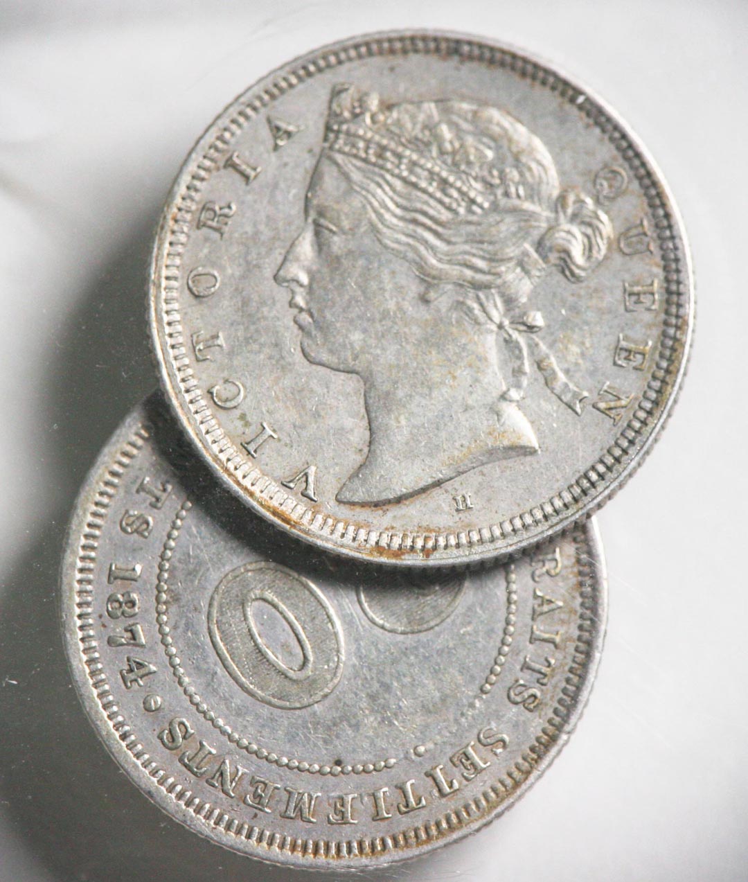 Someone-Did-A-Terrible-Thing-To-These-2-Coins.