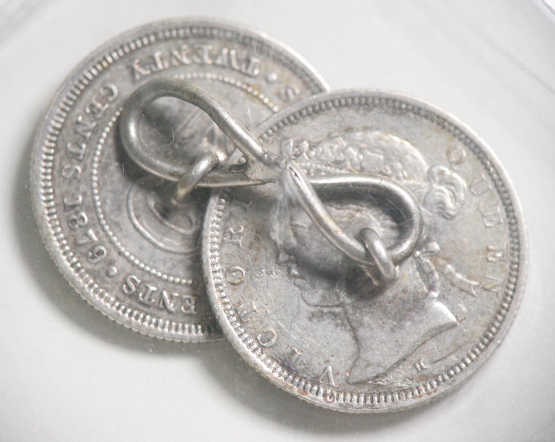 Someone-Did-A-Terrible-Thing-To-These-2-Coins.
