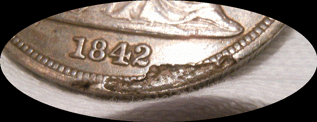1842-Seated-Dollar--Lamination?
