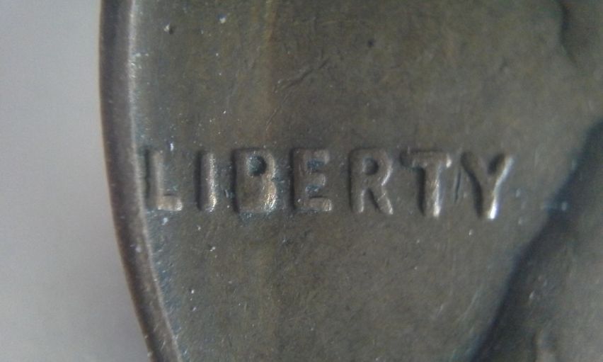 Two-1957-Wheat-Cents-With-Similar-Issues