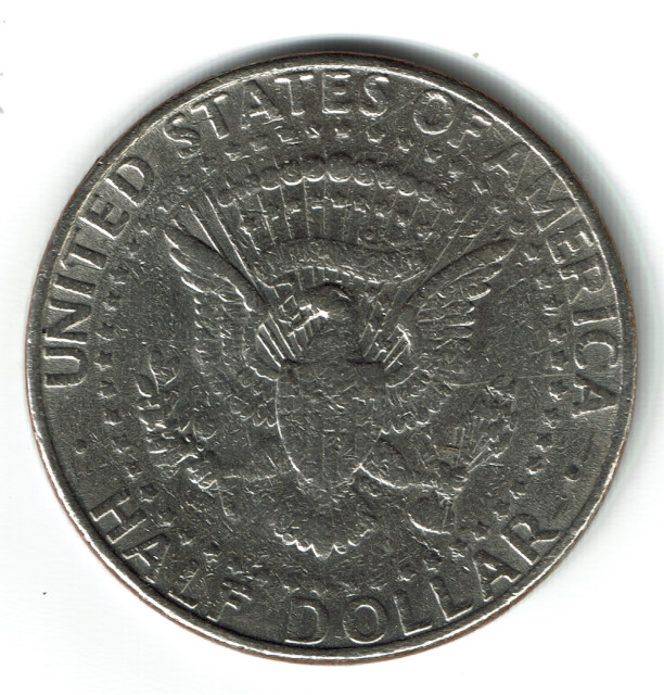 1991-Kennedy-Half-Struck-Through-Or-Damage-?