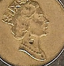Hole-In-Queen's-Neck-On-A-Twoonie....